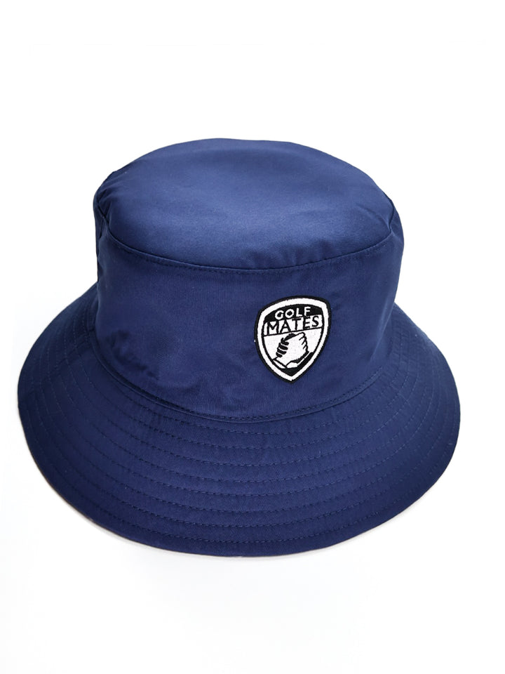 Navy bucket hat with a golfmates logo on a white background . designed for golf and sport