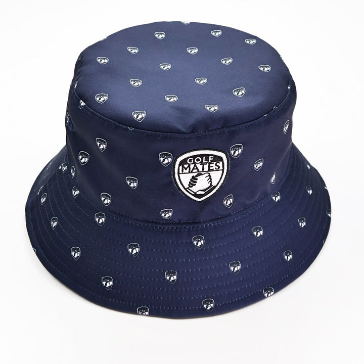 Navy bucket hat with white golfmates logo and patterns on a white background. Reversible hat with two prints. 